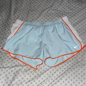 Nike Women's Sky Blue Athletic Shorts with Orange Trim
